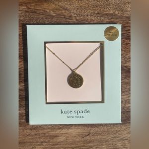 Kate Spade gold In the stars pendant necklace.